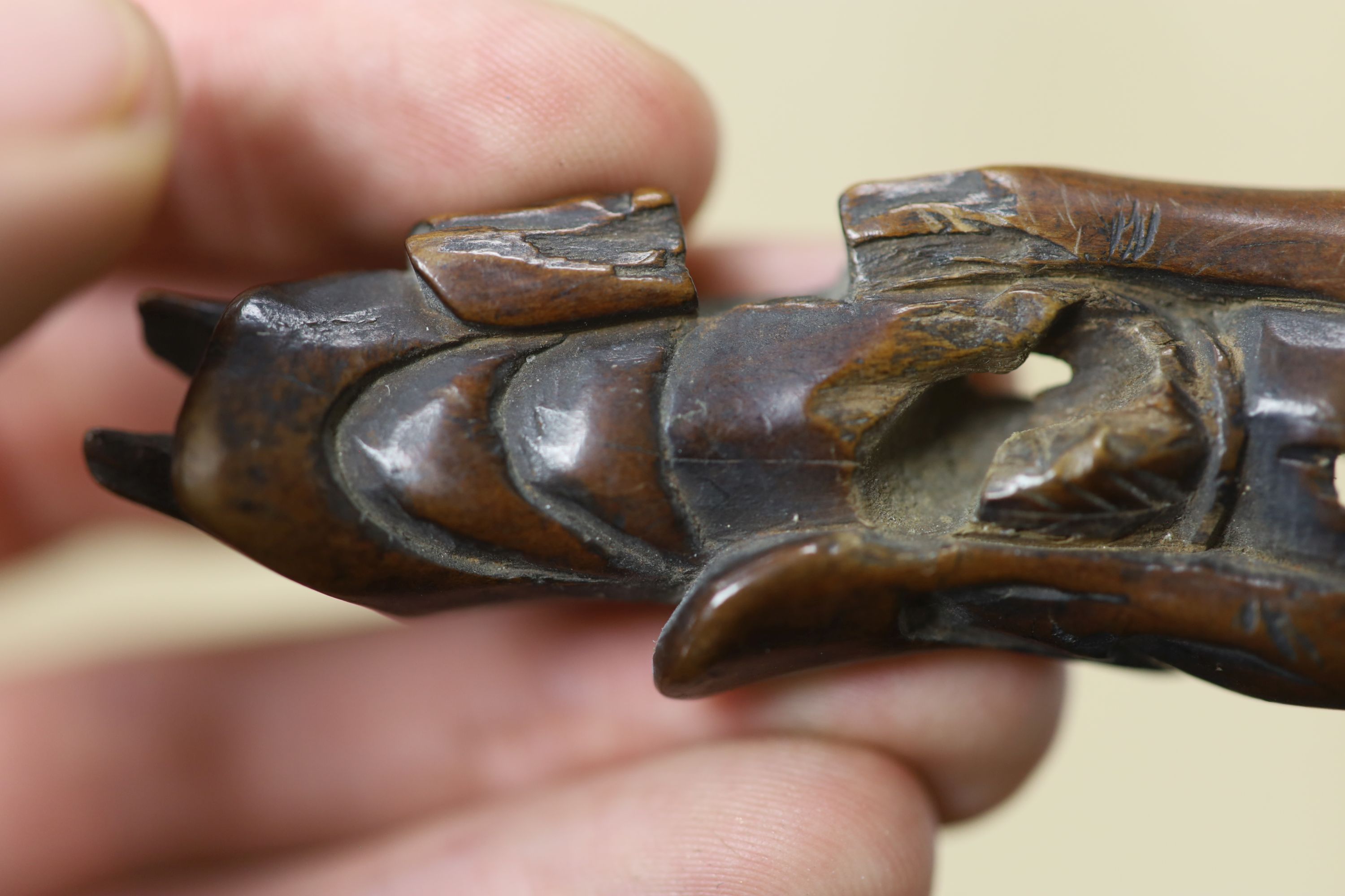 A small miscellaneous Oriental collection including enamel snuff boxes, Buddha carvings etc.